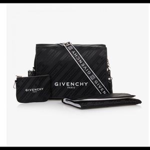 Givenchy baby diaper bag is a medium size and it is black